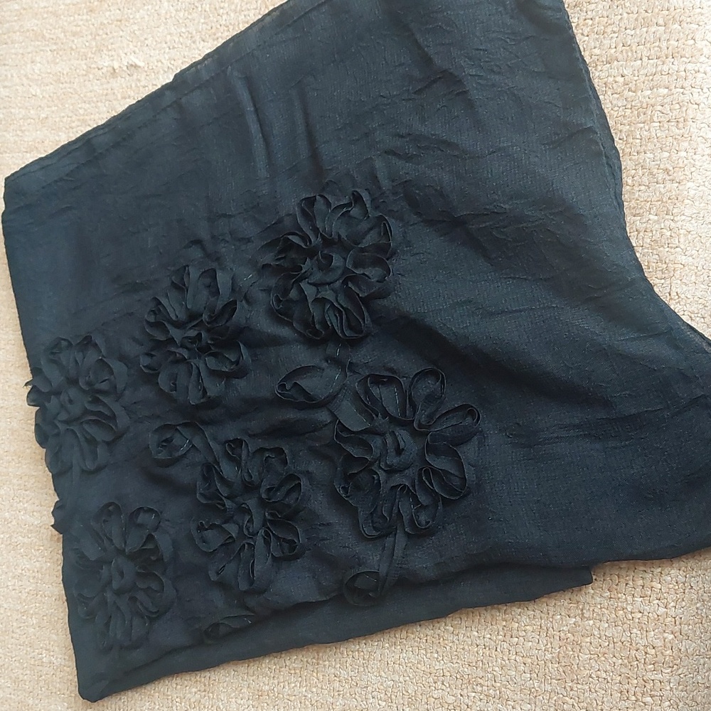 Sheer wrap with ribbon applique.